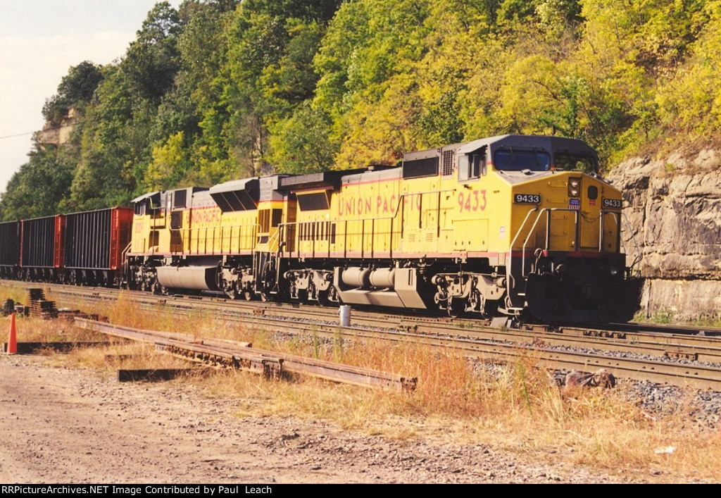 Helpers shove coal loads west